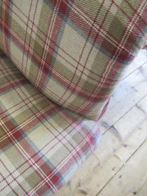 A VICTORIAN WALNUT FRAMED CHESTERFIELD SOFA, upholstered in wool tartan, raised on turned legs with Image