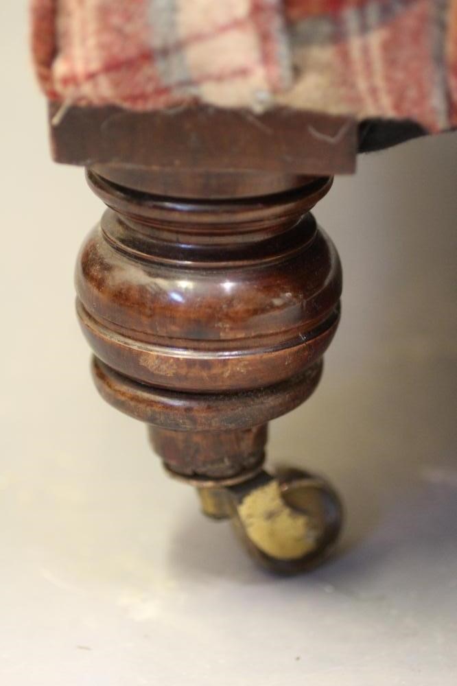 A VICTORIAN WALNUT FRAMED CHESTERFIELD SOFA, upholstered in wool tartan, raised on turned legs with Image