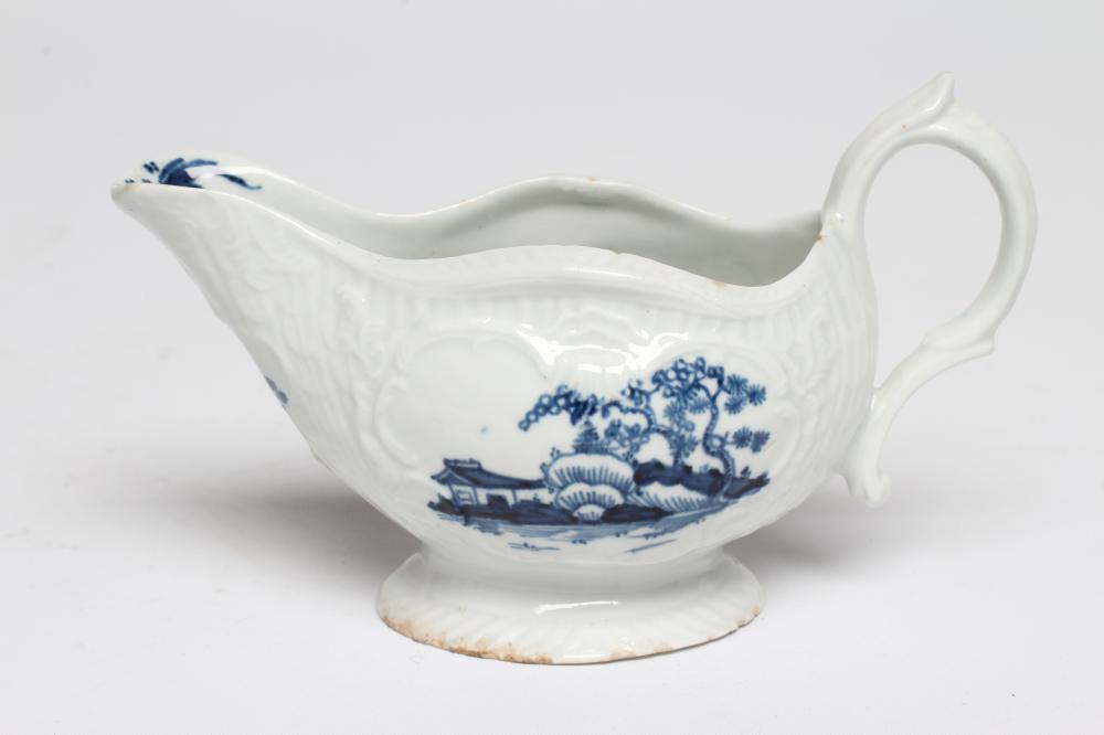 A CHRISTIANS PORCELAIN SAUCE BOAT, 1768-78, smaller but similar to the previous lot and painted with Image
