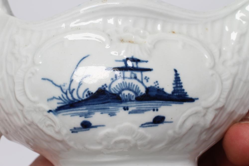 A CHRISTIANS PORCELAIN SAUCE BOAT, 1768-78, smaller but similar to the previous lot and painted with Image