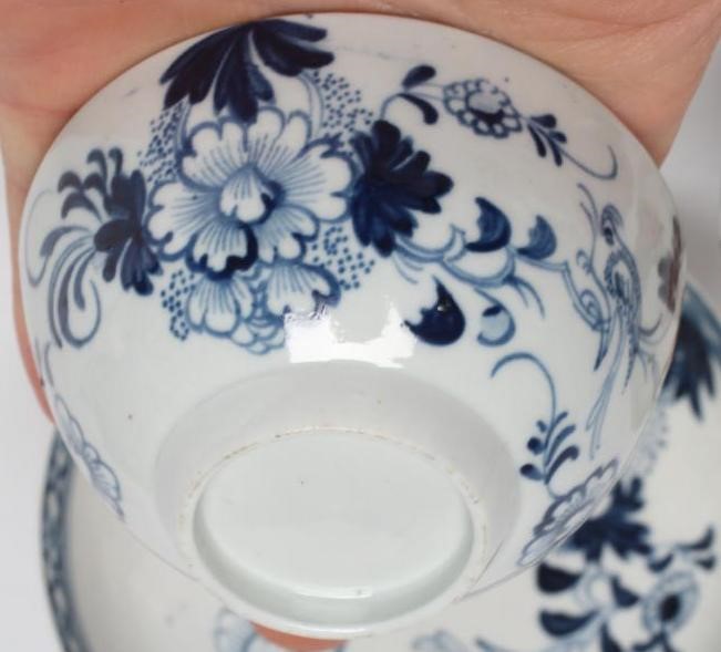 A JAMES PENNINGTON PORCELAIN TEA BOWL AND SAUCER Image