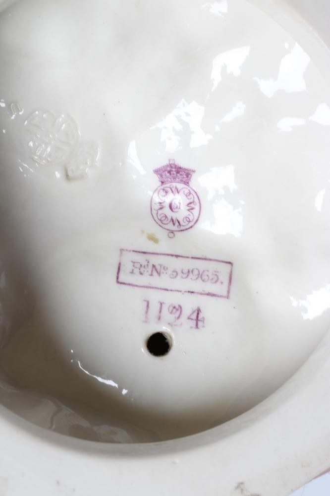 A ROYAL WORCESTER PORCELAIN FIGURE Image