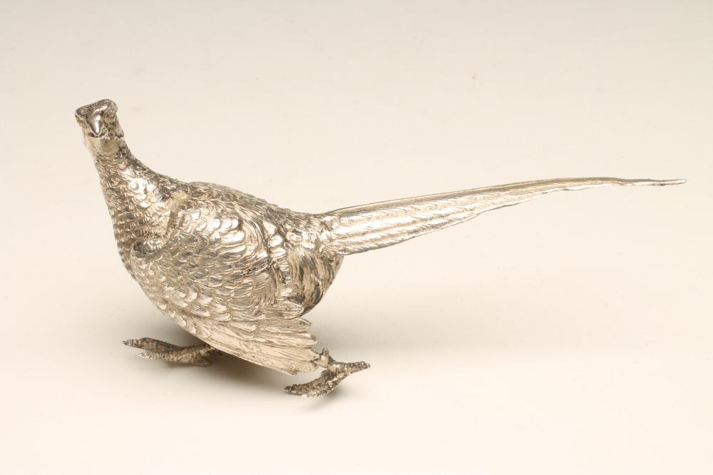 A SILVER MODEL OF A RUNNING PHEASANT Image