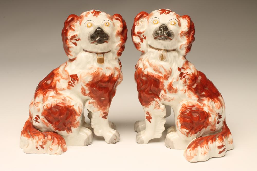 A PAIR OF VICTORIAN STAFFORDSHIRE PORCELLANEOUS SPANIELS Image
