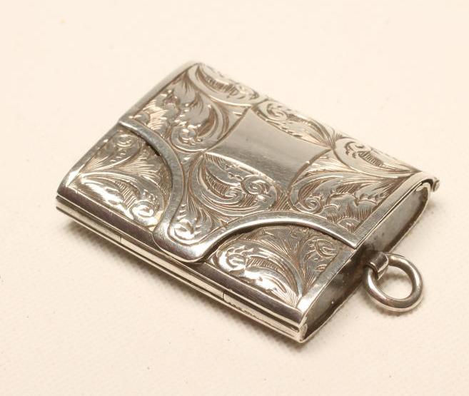 A VICTORIAN SILVER PENDANT VINAIGRETTE Image