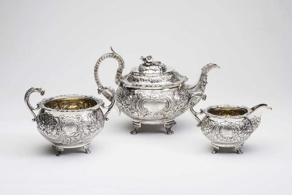 A GEORGE IV IRISH SILVER THREE PIECE TEA SERVICE Image
