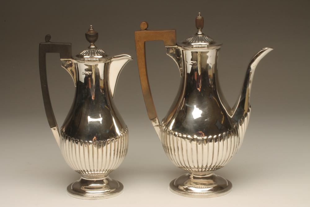 A  LATE VICTORIAN SILVER MATCHED CAFE-AU-LAIT SET Image