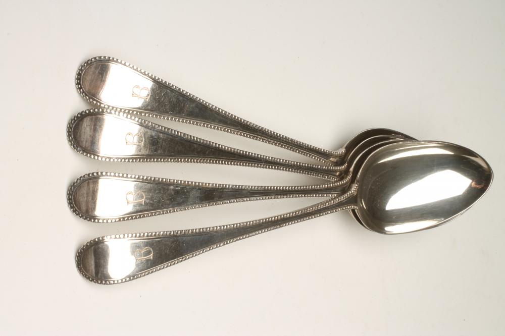 A SET OF FOUR GEORGE III SILVER TABLESPOONS Image