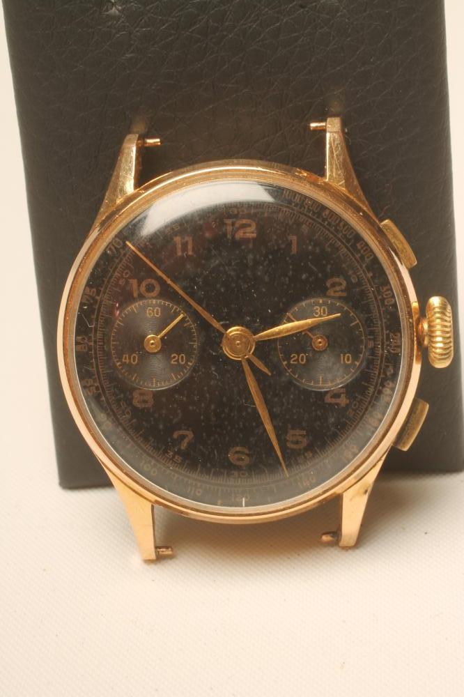 AN 18K GOLD CHRONOGRAPH Image
