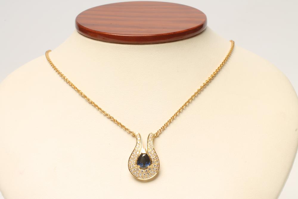 A SAPPHIRE AND DIAMOND PENDANT Image