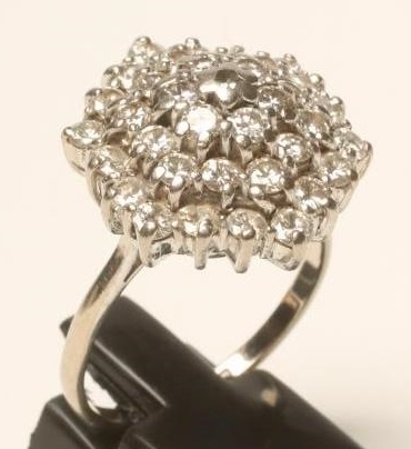 A DIAMOND CLUSTER RING Image