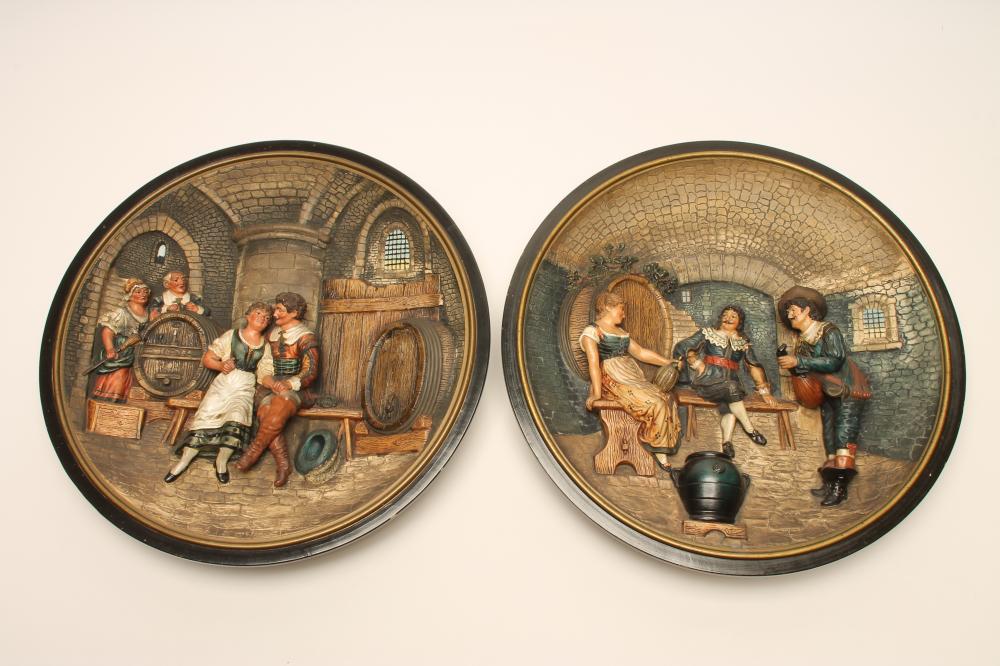 A PAIR OF MUSTERSCHUTZ EARTHENWARE PLAQUES Image