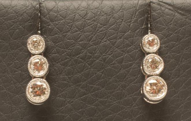 A PAIR OF DIAMOND DROP EAR STUDS Image