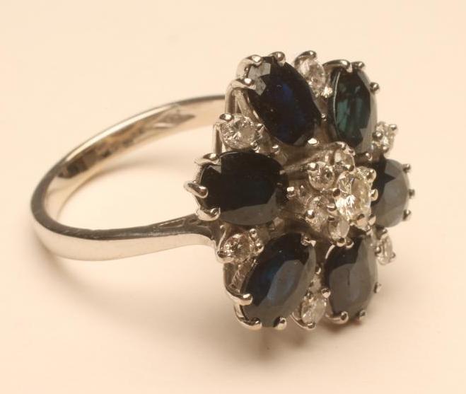 A SAPPHIRE AND DIAMOND COCKTAIL RING Image