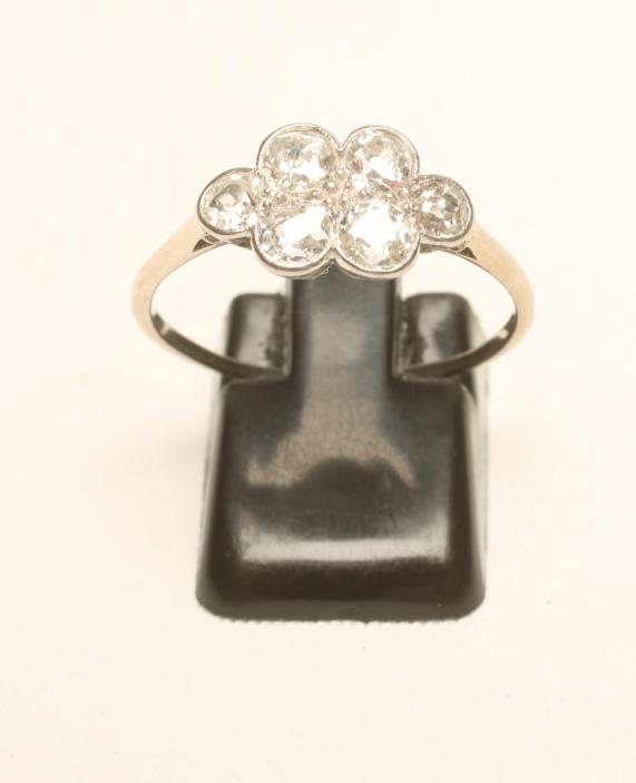A SIX STONE DIAMOND RING Image