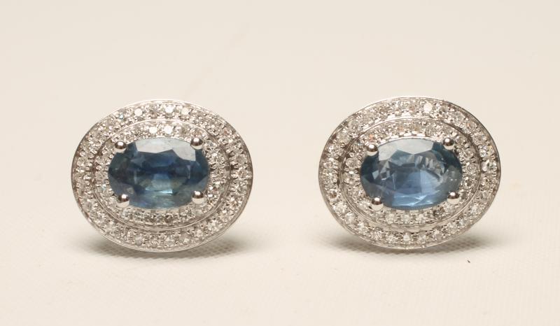 A PAIR OF SAPPHIRE AND DIAMOND CLUSTER EAR STUDS Image