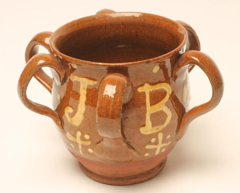 A DOCUMENTARY SLIPWARE VESSEL Image