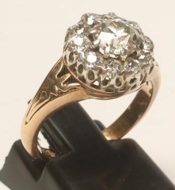 A DIAMOND CLUSTER RING Image