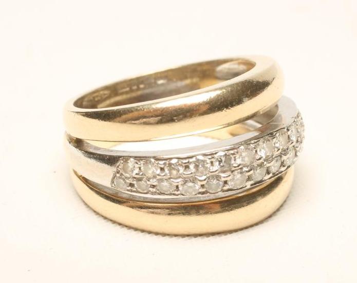A TRIPLE OPEN BAND COCKTAIL RING Image