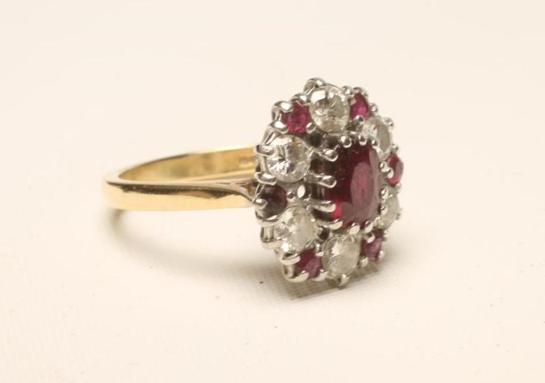 A RUBY AND DIAMOND CLUSTER RING Image