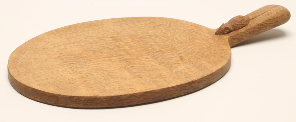 AN OAK CHEESEBOARD by Robert Thompson Image