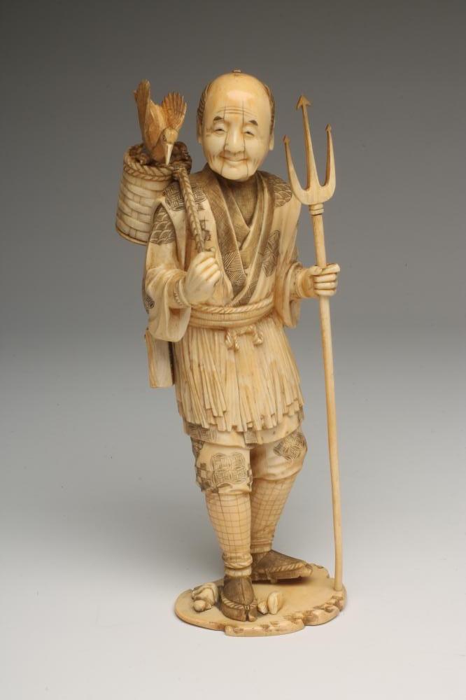 A JAPANESE SECTIONAL IVORY OKIMONO Image