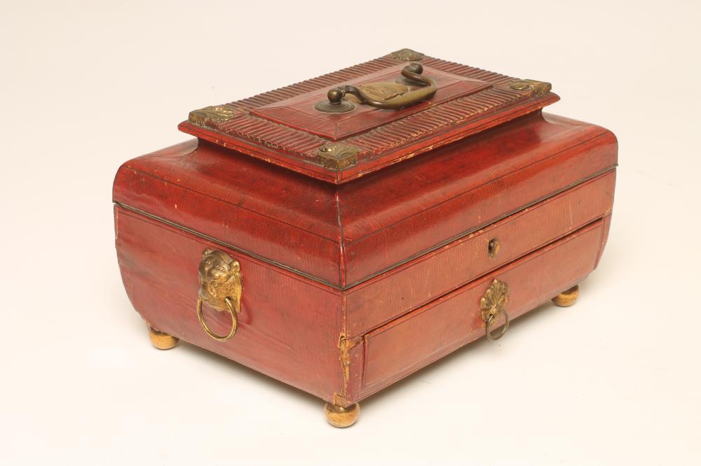 A REGENCY RED MOROCCO LEATHER SEWING CASKET of sarcophagus form Image