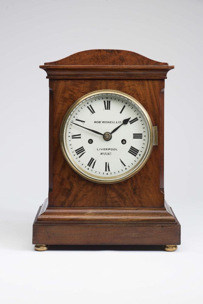 A MAHOGANY CASED MANTEL CLOCK Image