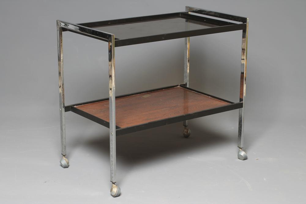 A HOWARD MILLER LIMITED METAL TEA TROLLEY of two tier oblong form Image