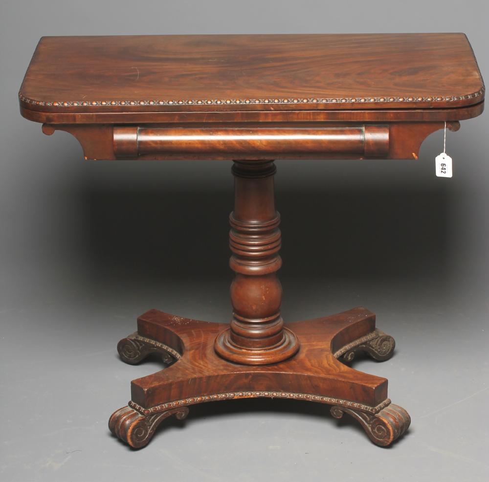 A GEORGE IV MAHOGANY FOLDING CARD TABLE of rounded oblong form Image