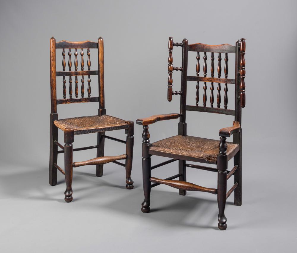 A WELL MATCHED SET OF EIGHT LANCASHIRE ASH DINING CHAIRS with rush seats Image