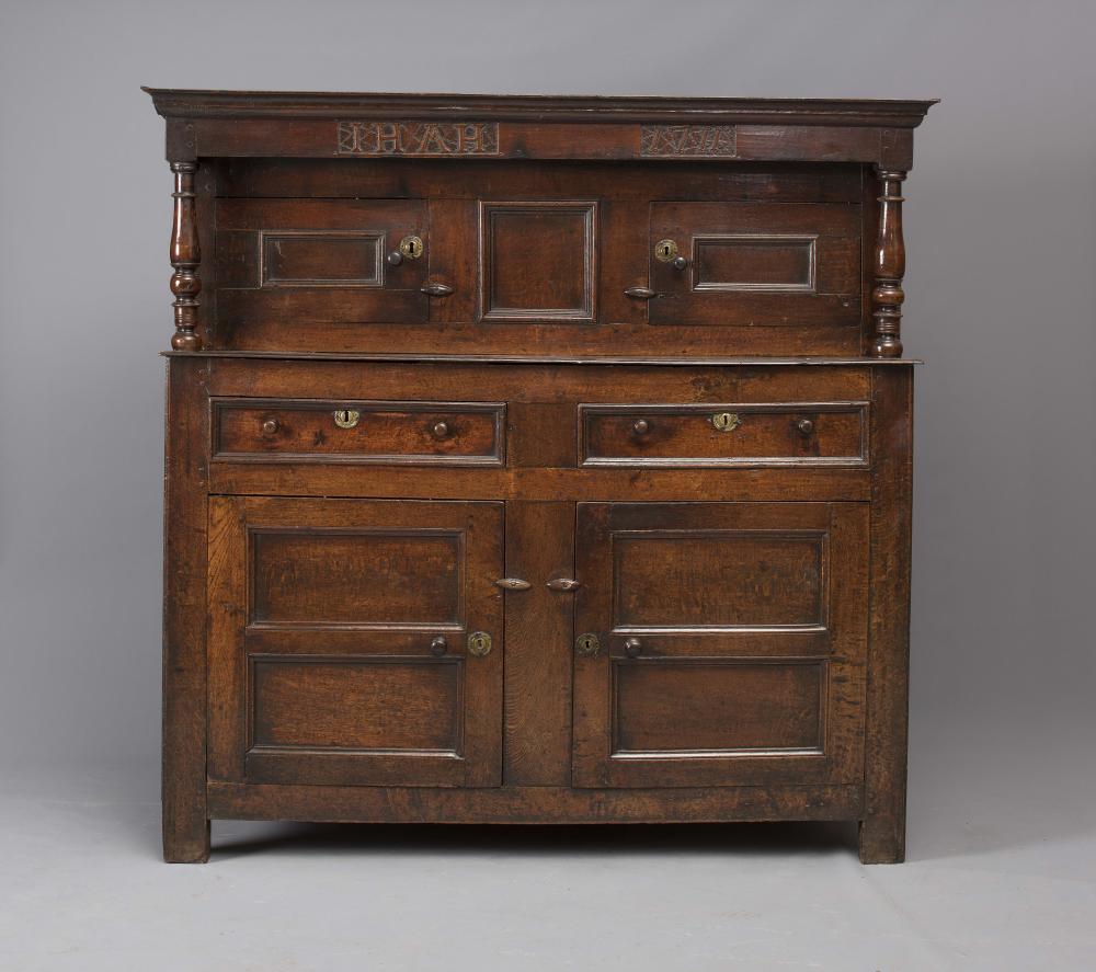AN OAK PRESS CUPBOARD Image
