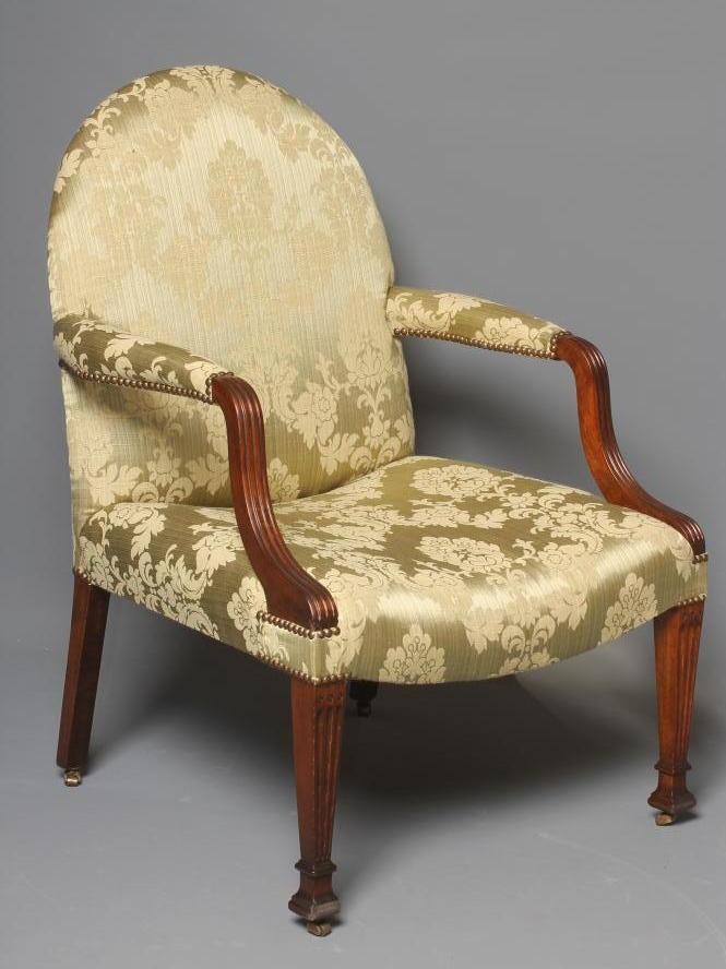 A GEORGIAN STYLE LIBRARY CHAIR Image
