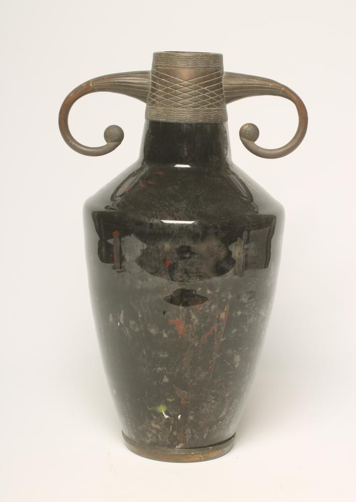 AN ART DECO BROWN MARBLED GLASS VASE of baluster form with angular shoulders and tapering Image