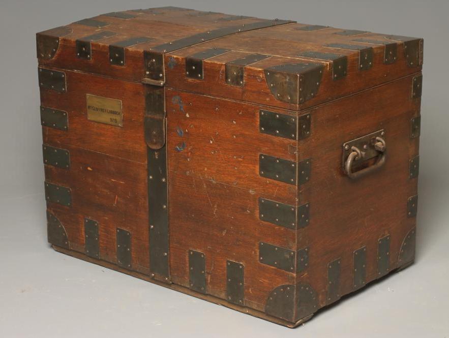 AN OAK AND IRON BOUND SILVER CHEST Image