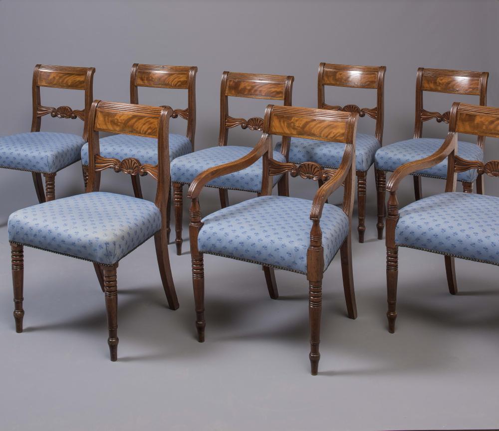 A SET OF EIGHT REGENCY MAHOGANY AND BRASS INLAID DINING CHAIRS including two elbow chairs Image
