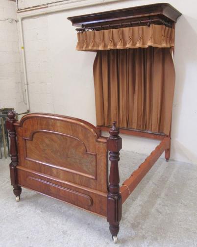 A VICTORIAN MAHOGANY FRAMED HALF TESTER SINGLE BEDSTEAD complete with salmon pink silk drapes and Image