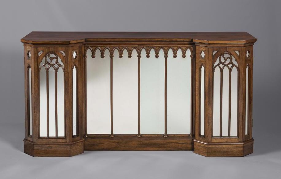 A VICTORIAN GOTHIC ROSEWOOD SIDE CABINET of inverted breakfront form Image