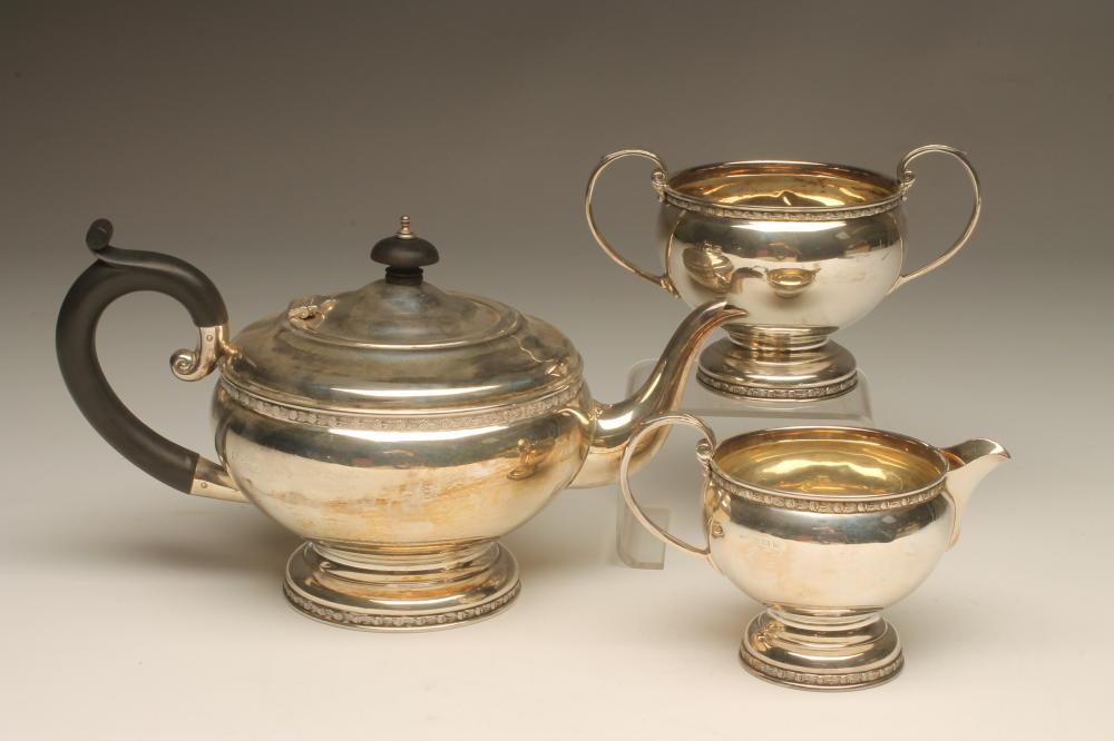 A THREE PIECE SILVER TEA SERVICE Image