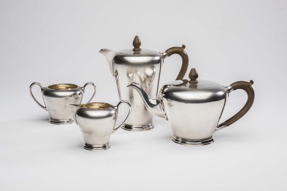 A FOUR PIECE SILVER TEA AND COFFEE SERVICE Image