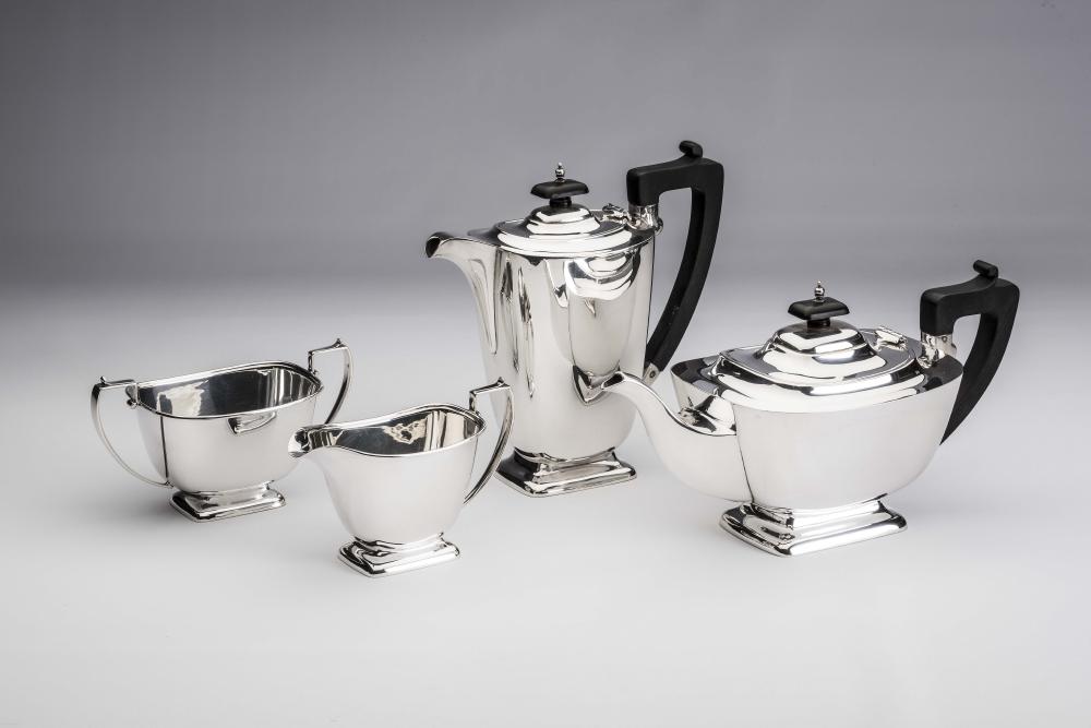 AN ART DECO FOUR PIECE SILVER TEA AND COFFEE SERVICE Image