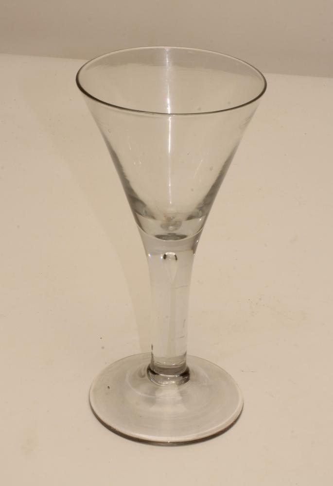 A LARGE TRUMPET WINE GLASS Image