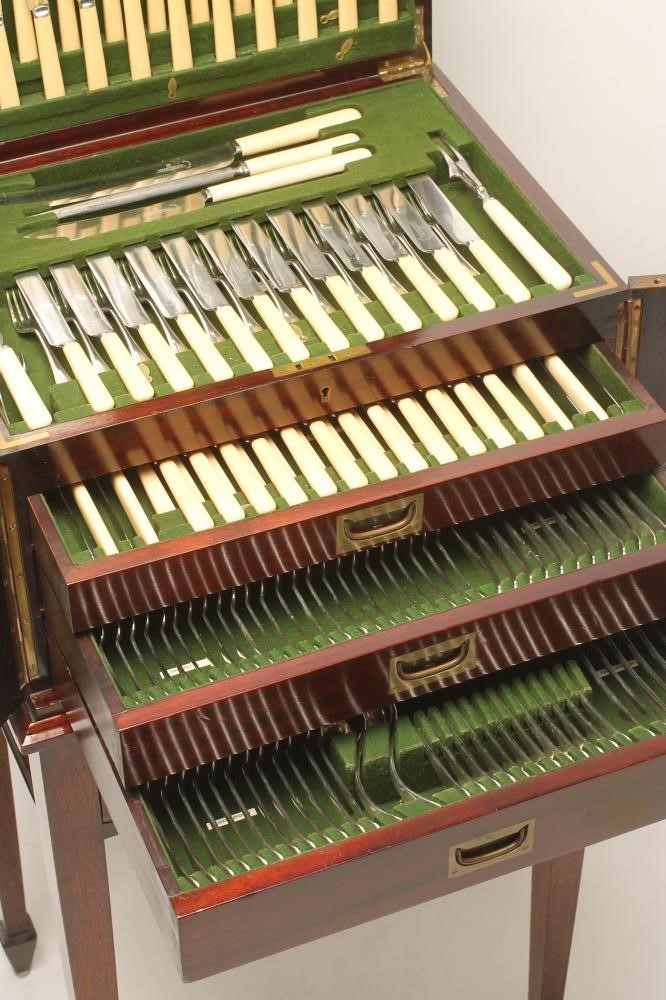 AN EPNS TABLE SERVICE FOR TWELVE PLACE SETTINGS Image