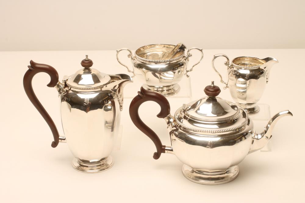 A FOUR PIECE SILVER TEA AND COFFEE SERVICE Image