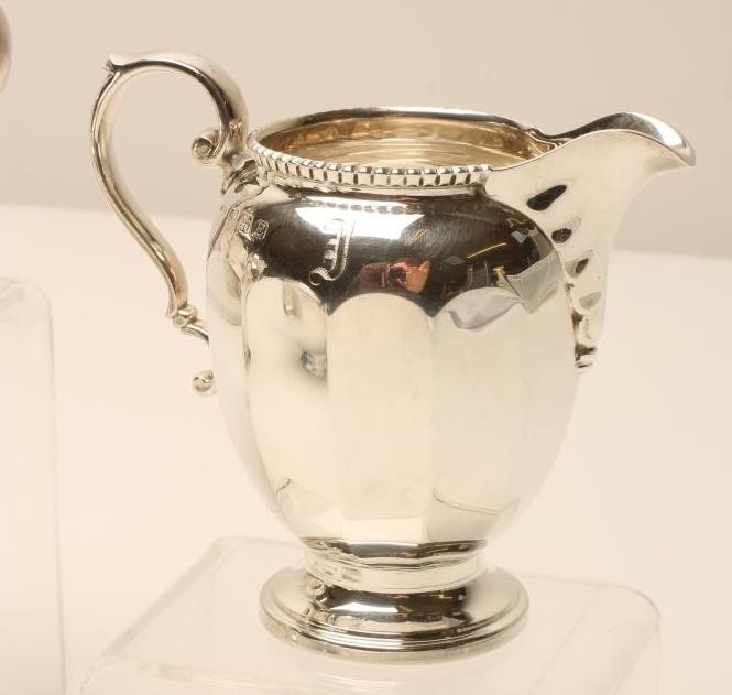 A FOUR PIECE SILVER TEA AND COFFEE SERVICE Image