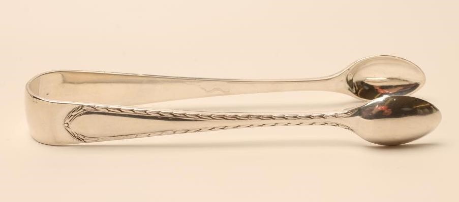 A FOUR PIECE SILVER TEA AND COFFEE SERVICE Image