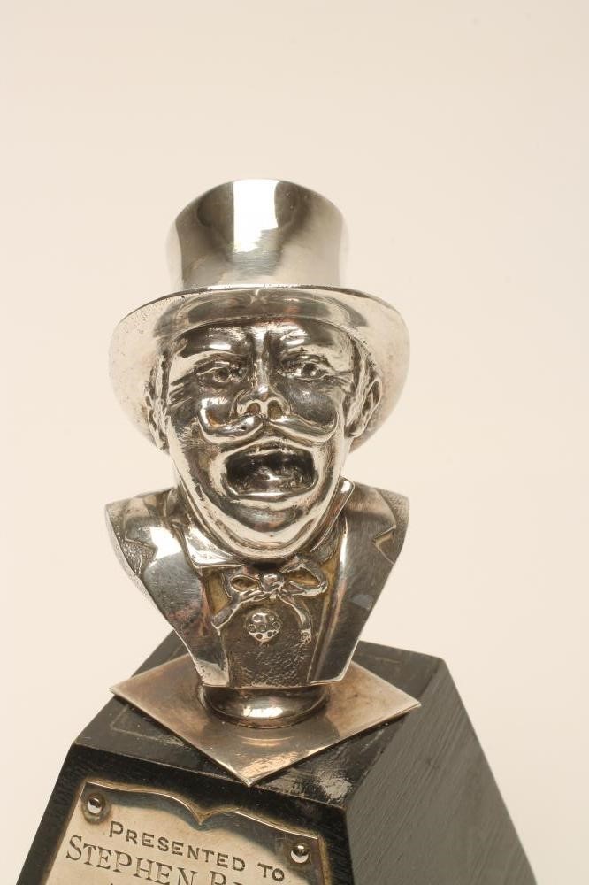 A SILVER HEAD AND SHOULDERS MODEL Image