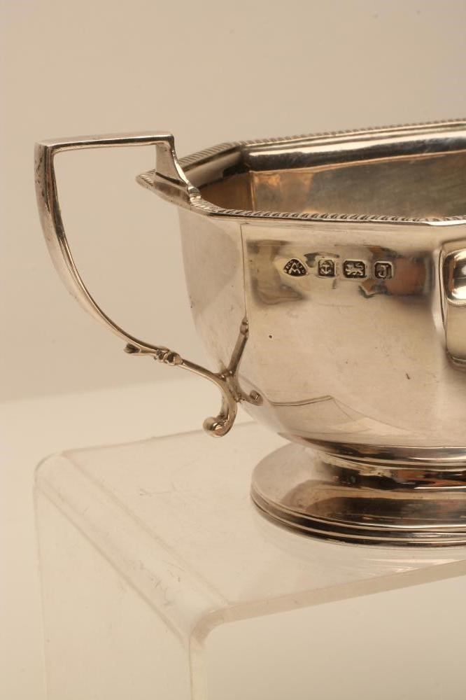 A THREE PIECE SILVER TEA SERVICE Image