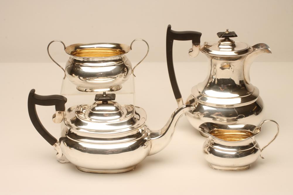 A COMPOSITE THREE PIECE SILVER TEA SERVICE Image