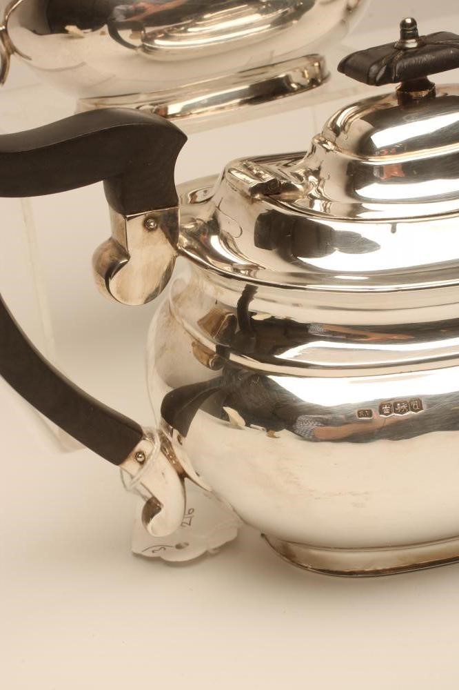A COMPOSITE THREE PIECE SILVER TEA SERVICE Image